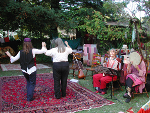 Donna and Natalie do a line dance.